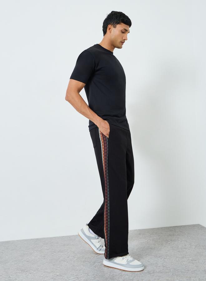 Styli Men Black Oversized Terry Printed Panel Joggers - Image 2